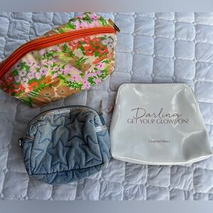 Bundle of makeup travel bags mod floral denim starts and charlotte tilbury